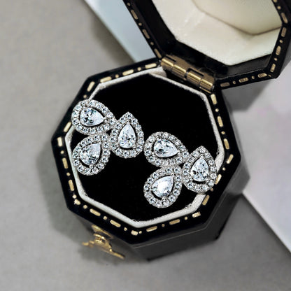 [Joyas Regalia] Pendientes de corte de pera con forma de flor ornamentada