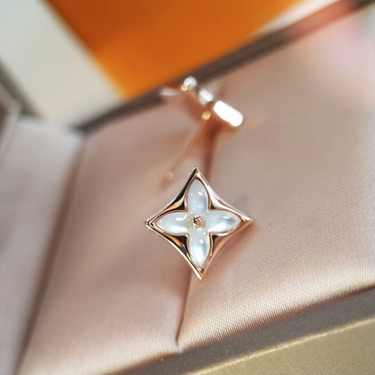 [Bijoux Regalia]Boucles d'oreilles en or rose et nacre étoilée