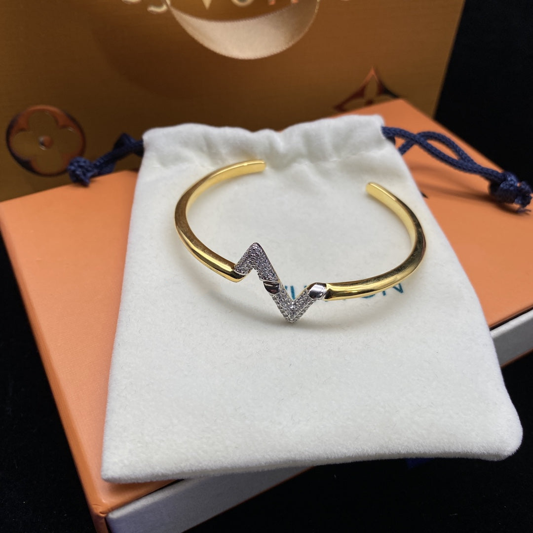[Joyas Regalia]PULSERA ABIERTA DE ORO CON DIAMANTES VOLTE UPSITE DOWN