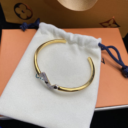 [Joyas Regalia]PULSERA ABIERTA DE ORO CON DIAMANTES VOLTE UPSITE DOWN