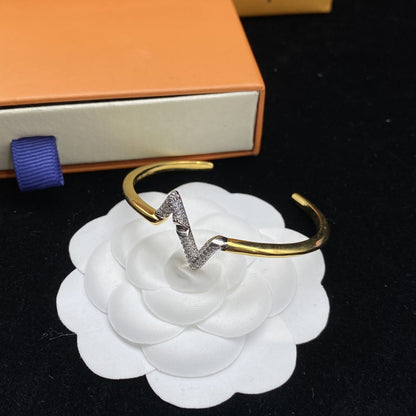 [Joyas Regalia]PULSERA ABIERTA DE ORO CON DIAMANTES VOLTE UPSITE DOWN