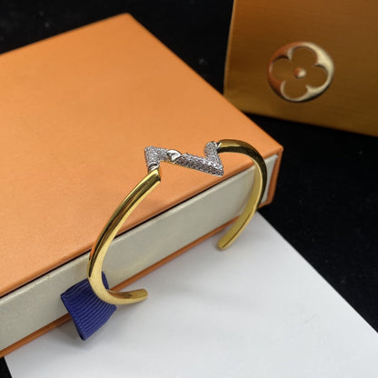 [Joyas Regalia]PULSERA ABIERTA DE ORO CON DIAMANTES VOLTE UPSITE DOWN