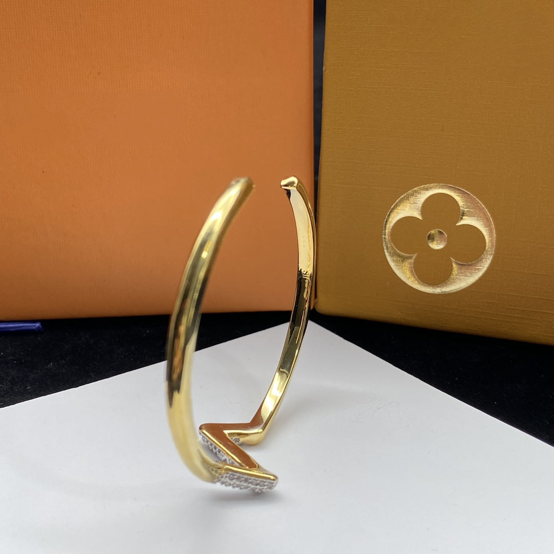 [Joyas Regalia]PULSERA ABIERTA DE ORO CON DIAMANTES VOLTE UPSITE DOWN
