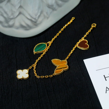 [Joyas Regalia] PULSERA DE ORO CON 5 MOTIVOS LUCKY SPRING 