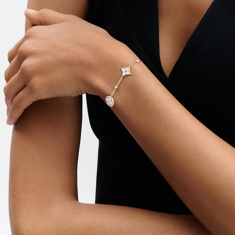 [Regalia jewelry]STAR AND SUN 4 MOTIF WHITE MOP PINK GOLD BRACELET
