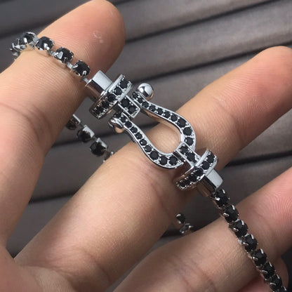 [Joyas Regalia]Pulsera de tenis Force con herradura grande y diamantes. 