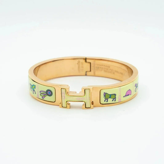 [Bijoux Regalia] Bracelet H en or rose et céramique crème
