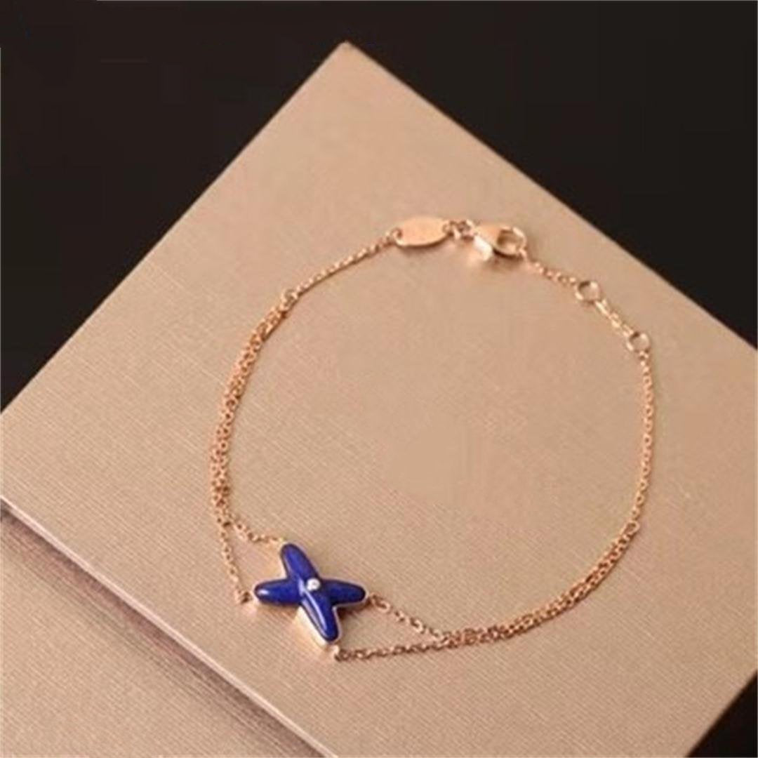 [Bijoux Regalia] Bague en forme de fleur de trèfle à quatre feuilles à motif creux