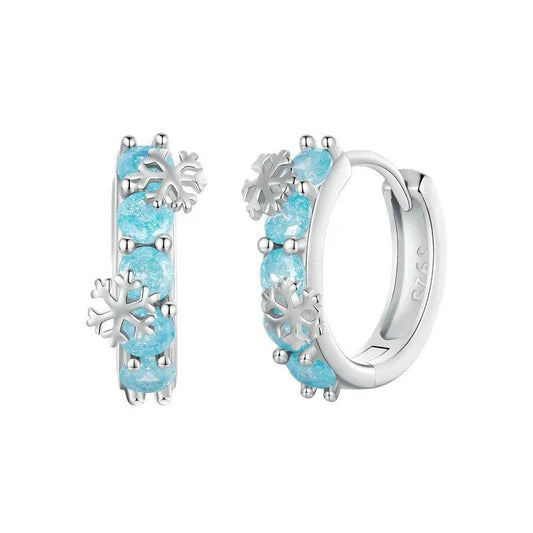 Pendientes de aro con circonitas y flor de hielo bañados en platino