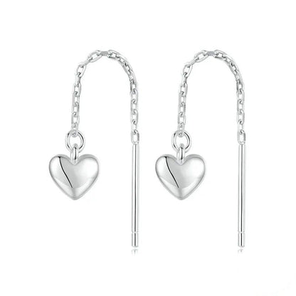 Pendientes largos con borlas y forma de corazón