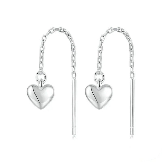 Pendientes largos con borlas y forma de corazón