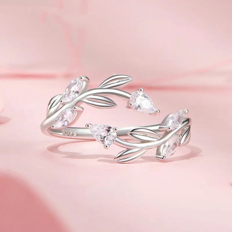 Anillo ajustable con hojas simples y hojas de la suerte