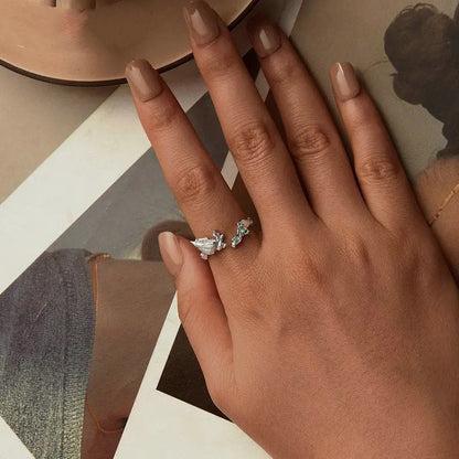 Anillo abierto de caracola con incrustaciones de circonita verde, serie océano, anillos ajustables