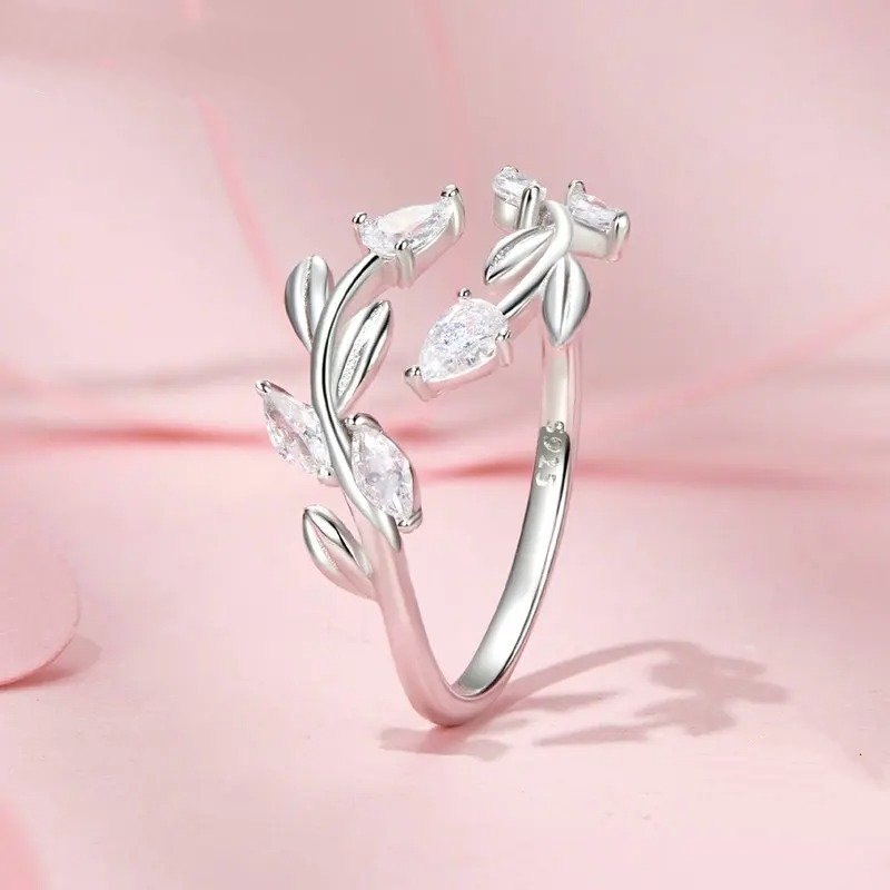Anillo ajustable con hojas simples y hojas de la suerte