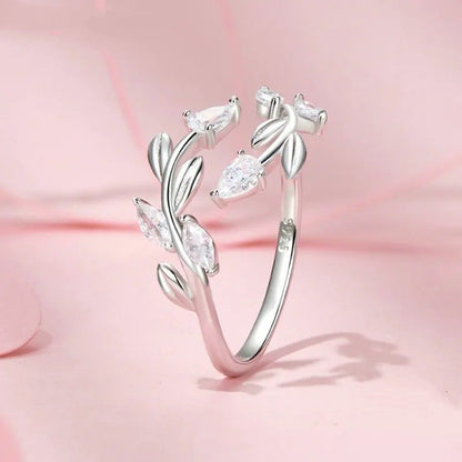 Anillo ajustable con hojas simples y hojas de la suerte