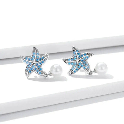 Pendientes de estrella de mar con circonita azul océano y pendientes colgantes de concha y perla