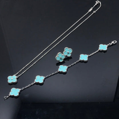 [Bijoux Regalia] BOUCLES D'OREILLES CLOVER 1 DIAMANT BLEU CIEL ARGENT