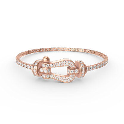 [Joyas Regalia]Pulsera de tenis Force con herradura grande y diamantes. 