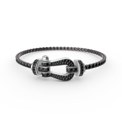 [Joyas Regalia]Pulsera de tenis Force con herradura grande y diamantes. 